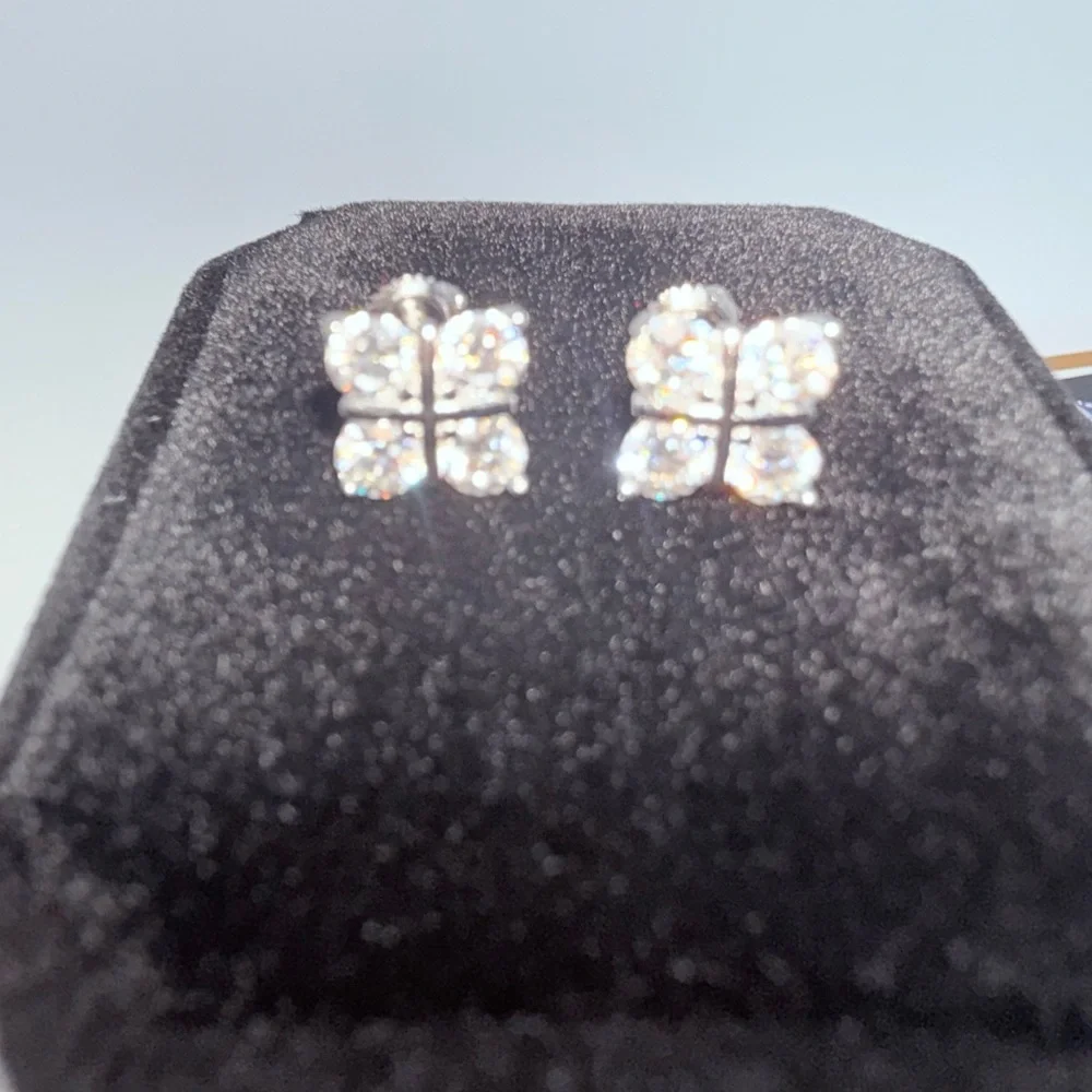 1.6ct Moissanite Cross Over Stud Earrings . Platinum plated .